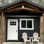 Exterior view of Kenai Adventure Cabins in Soldotna, Alaska — a cozy hotel alternative on the Kenai Peninsula.